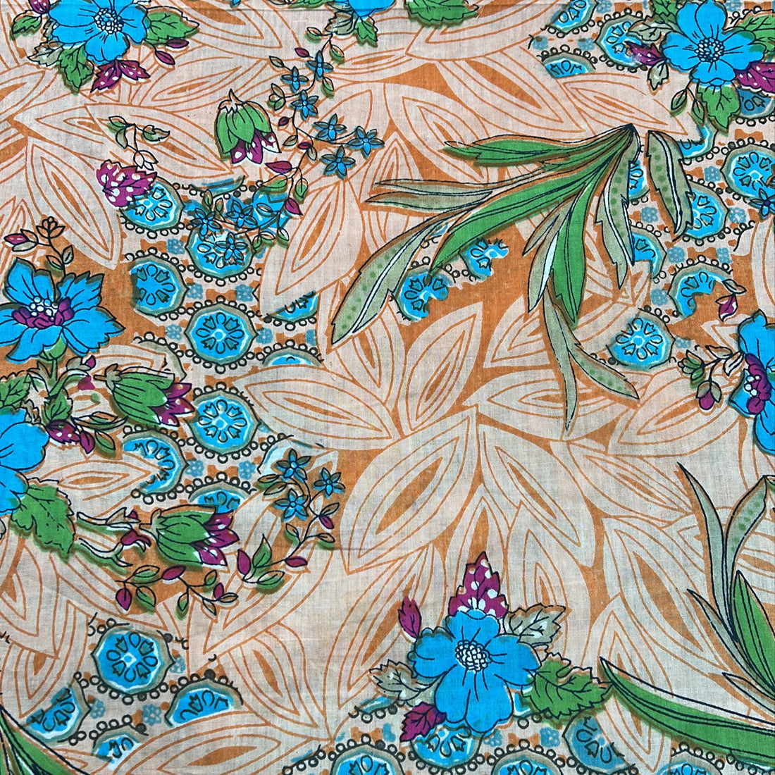 Peach Base Print On Cotton Fabric