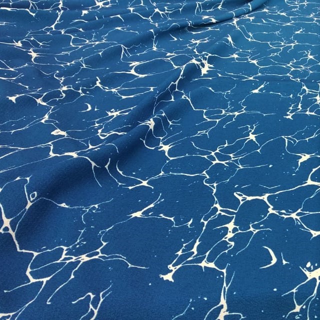 Blue And White Marble Print On Snake Crepe Fabric