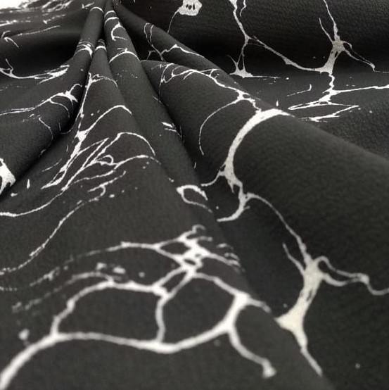 Black And White Mable Print On Snake Crepe Fabric