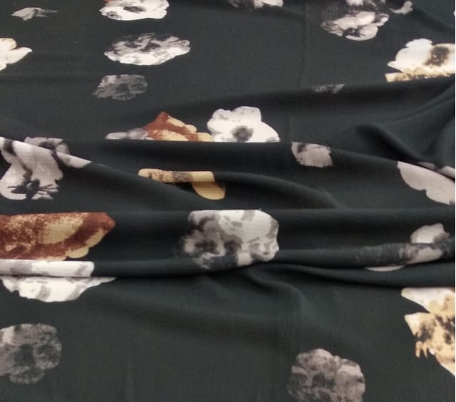 Black And Bloom Print On Snake Crepe Fabric